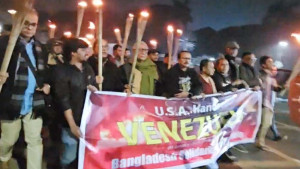 ভেনেজুয়েলায় মার্কিন হামলা ও মাদুরোকে আটকের প্রতিবাদে ঢাকায় মশাল মিছিল