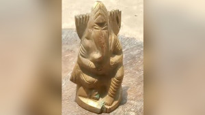 মাটির নিচে মিলল ধাতব গণেশ মূর্তি